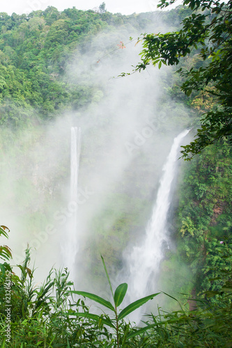 Tad fane waterfall in the morning mist.