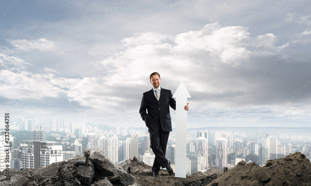 Business conceptual image of businessman in ruins Business conceptual image of businessman in ruins