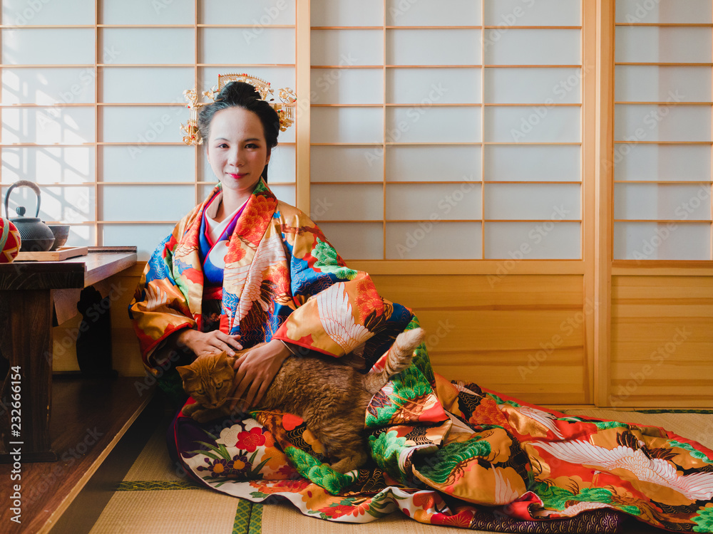 Asian woman in traditional kimono clothing Asian woman in traditional kimono clothing