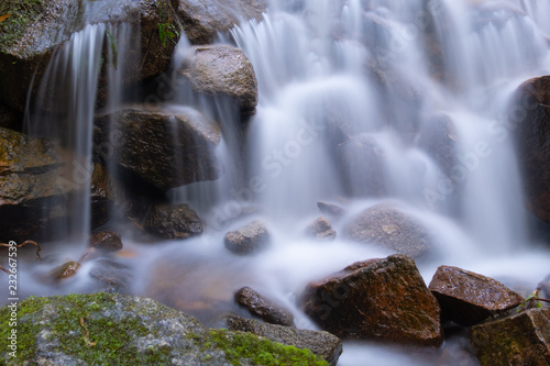 beautiful smoothly flowing water at Mea Kampong waterfall, Chaingmai provice, Thailand. Long exposure, close up