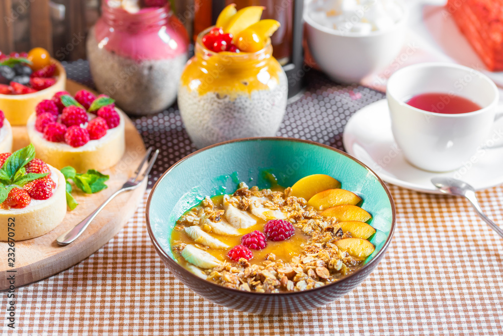 Porridge of muesli with fruit. Fresh fruit in porridge. Muesli with fruits. Muesli with fruit puree. Porridge of muesli with fruit. Fresh fruit in porridge. Muesli with fruits. Muesli with fruit puree.