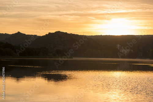 Sunset in the ruidera lagoons with the golden sky © vicenfoto