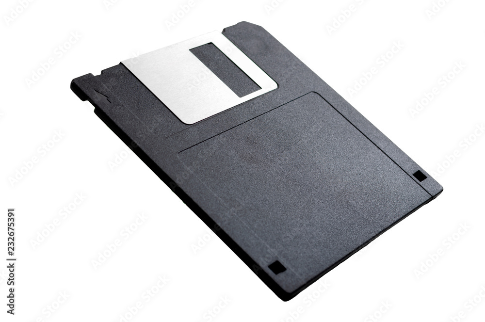 Obsolete data storage technology, retro digital medium and nostalgia concept with a tilted floppy disk isolated on white background leaning on its axis with a clip path cutout Obsolete data storage technology, retro digital medium and nostalgia concept with a tilted floppy disk isolated on white background leaning on its axis with a clip path cutout