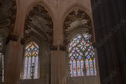 Colored flecks of sunlight on church, in Batalha Monastery, also known as Monastery of Saint Mary of the Victory, Portugal