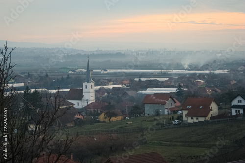 View of the village of Curteni in Transylvania, Romania. In the background is the city of Targu Mures.