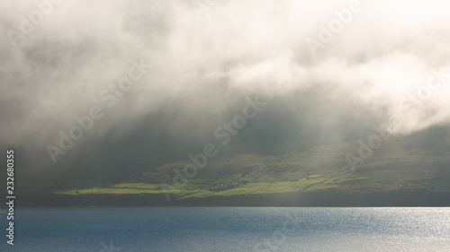 Fog building up on the shores of Faroe Islands