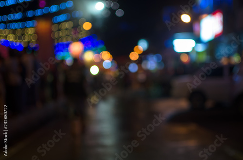 City  street  night defocused  light   blur bokeh. Colorful   dark background.