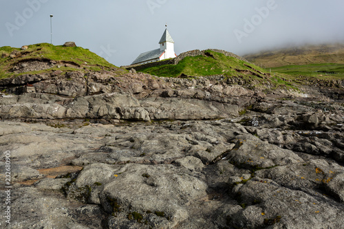 Isolated church somewhere in the middle of the highlands in Faroe Islands © Andrei