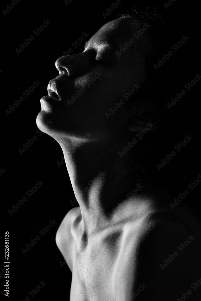 beautiful topless asia woman on black background monochrome