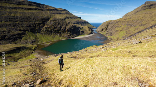 Girl exploring the beautiful highlands in Faroe Islands © Andrei