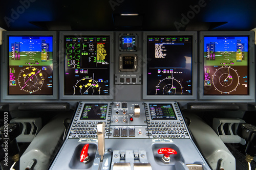 Closeup high detailed view on engine power control and other aircraft control unit in the cockpit of modern civil passenger airplane