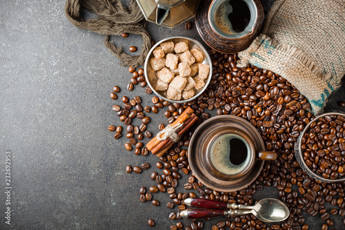 Black coffee in a composition with kitchen accessories