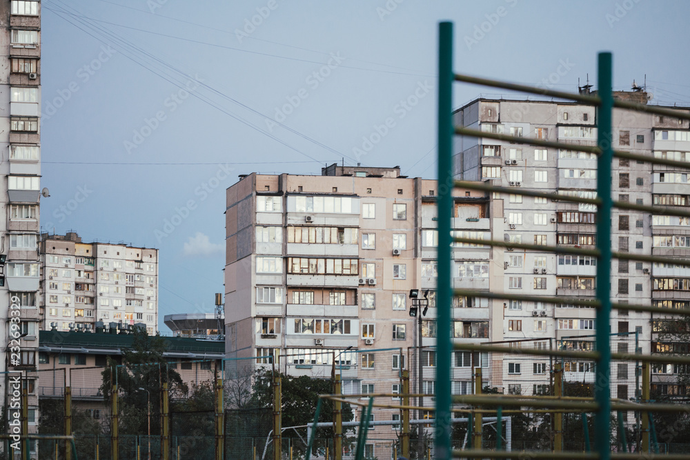 Ghetto architecture the collapse of the Soviet Union. Echo of the USSR.  Country high-rise houses in the evening in Obolon district in the city of  Kiev Ukraine Stock Photo | Adobe Stock