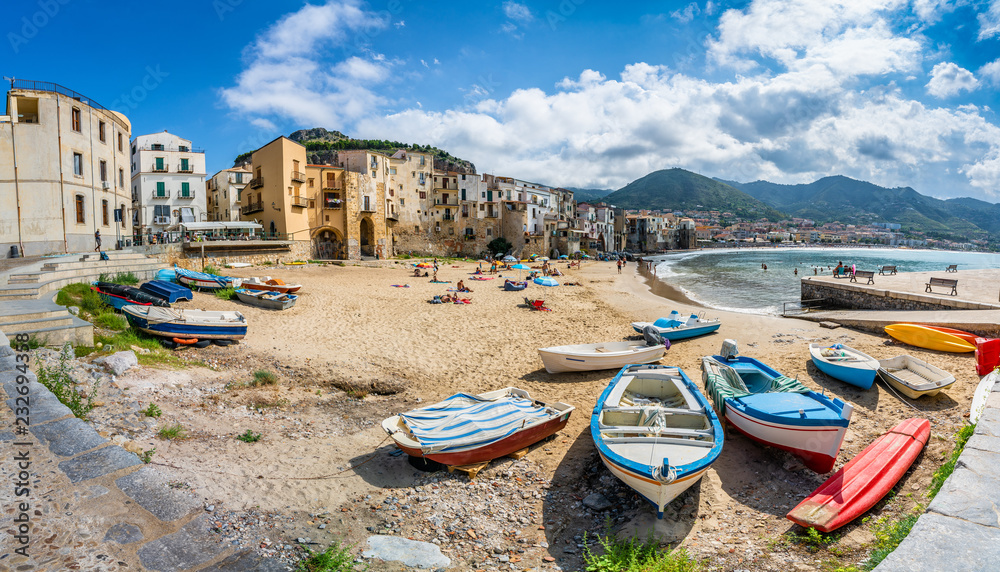 Landscape with beach and medieval Cefalu town, Sicily island, Italy