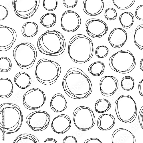 Abstract seamless pattern with black curved circles and shapes