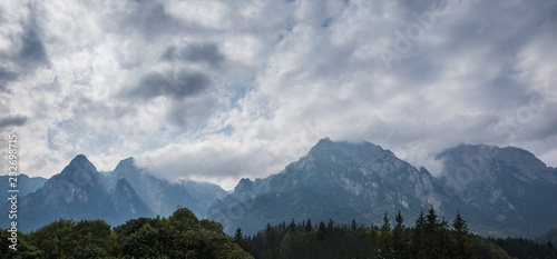 Dramatic panorama landscape of cloudy carpathians mountains