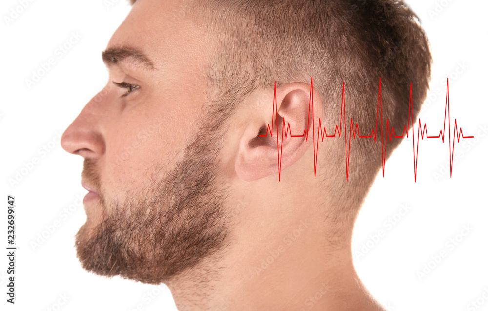 Obraz premium Young man on white background, closeup. Hearing problem