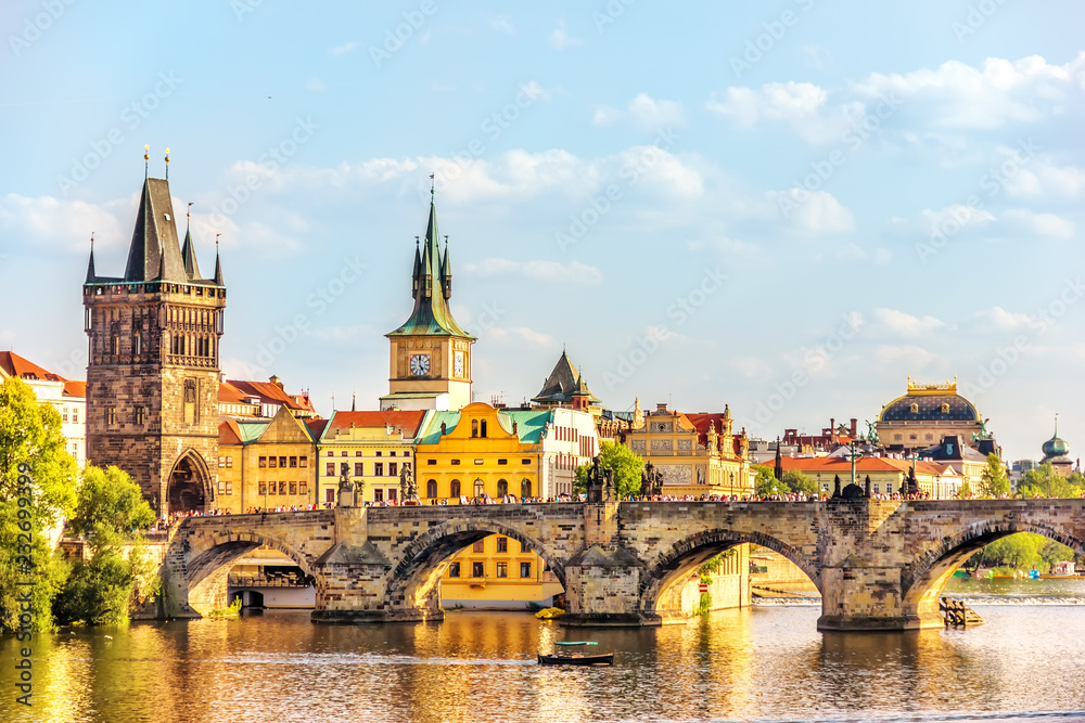 Charles Bridge, Prague towers and the National Theatre, summer d