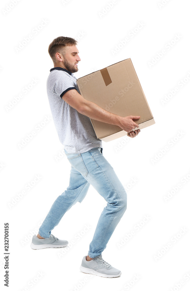 Full length portrait of young man carrying carton box on white background. Posture concept Full length portrait of young man carrying carton box on white background. Posture concept