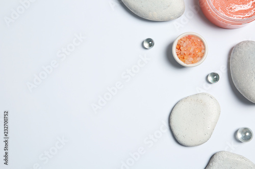 Flat lay composition with spa stones and space for text on white background