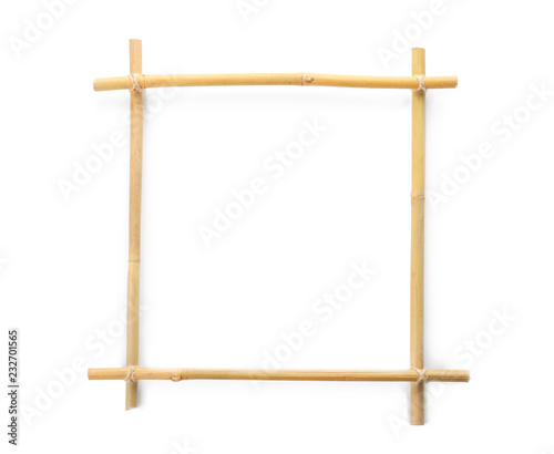 Frame made of dry bamboo sticks on white background. Space for design