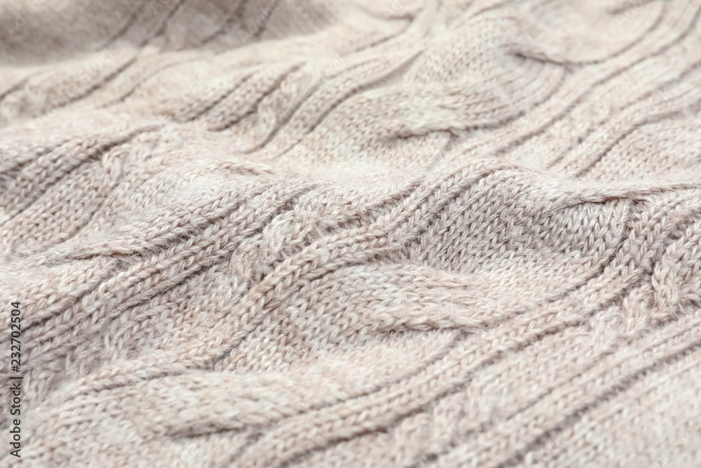 Texture of cozy warm sweater as background, closeup Texture of cozy warm sweater as background, closeup