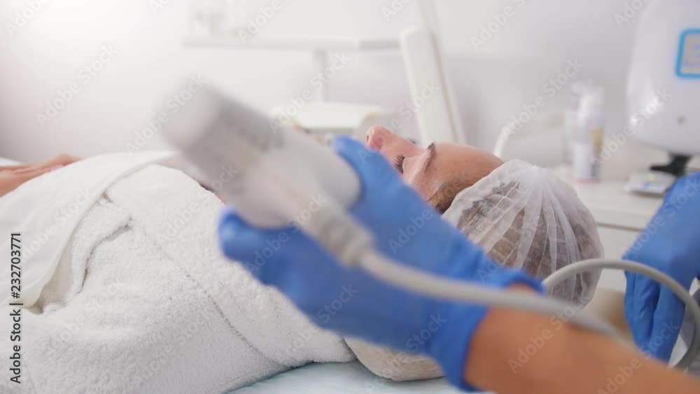 Cosmetology procedures. Pore cleansing. Working with special unstrument. Upper angle Cosmetology procedures. Pore cleansing. Working with special unstrument. Upper angle