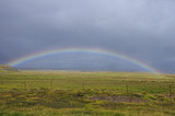Rainbow over meadow in Snaefellsnes peninsula, Iceland