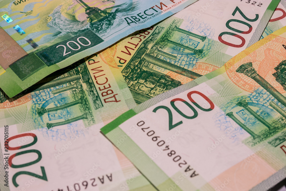 background of new banknotes worth 200 rubles. Russian currency background of new banknotes worth 200 rubles. Russian currency