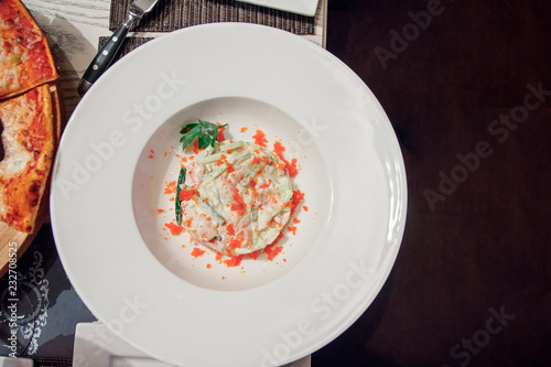 Obraz na płótnie salad on a white plate. the view from the top w salonie