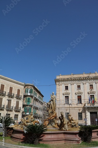 The Fontana di Artemide at Piazza Archimedes in Syracuse, Sicily Italy