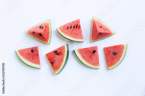 Watermelon pieces on white.