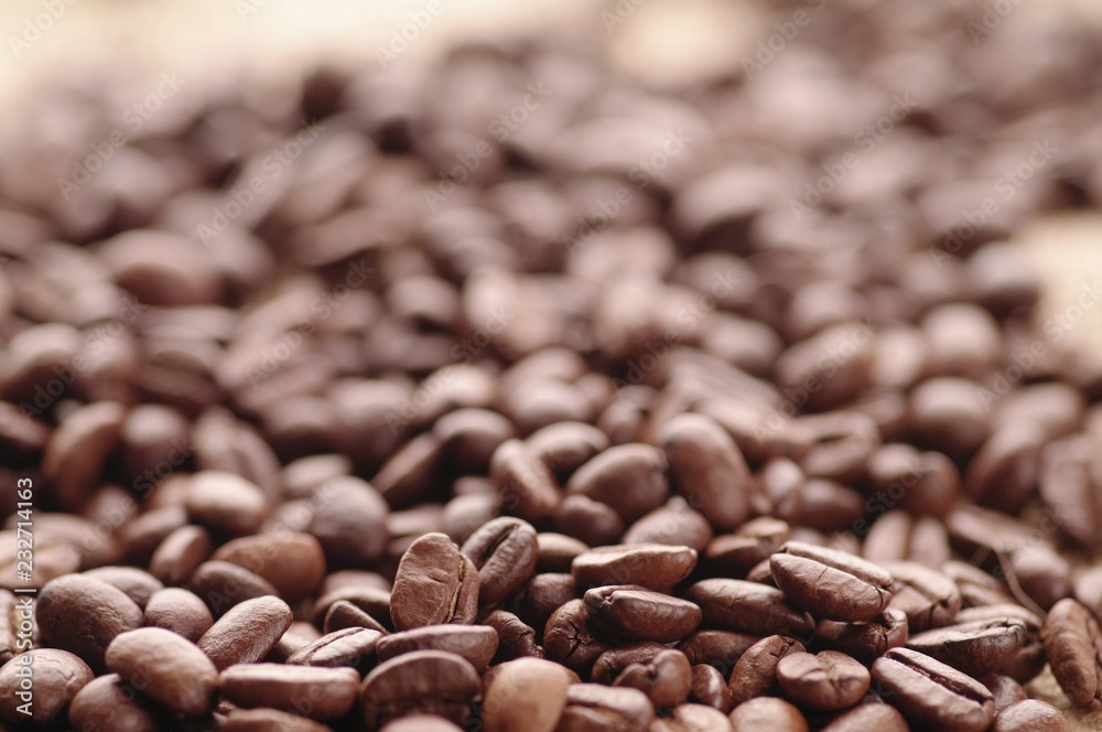 Aromatic roasted coffee background close up Aromatic roasted coffee background close up
