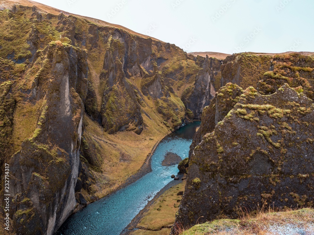 River running through the beautiful Fjaðrárgljúfur gorge in southern Iceland