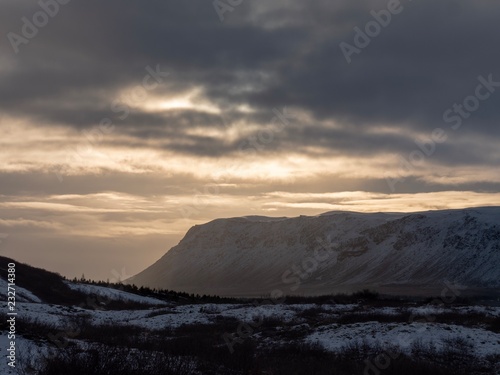 The glow of late afternoon sun through the clouds over central Iceland © Chris White