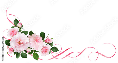 Pink rose flowers, satin ribbons and glitter confetti in a floral corner arrangement