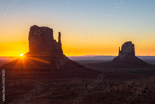 East and West Mitten Buttes at sunrise, Monument Valley Navajo Tribal Park on the Arizona-Utah border, USA
