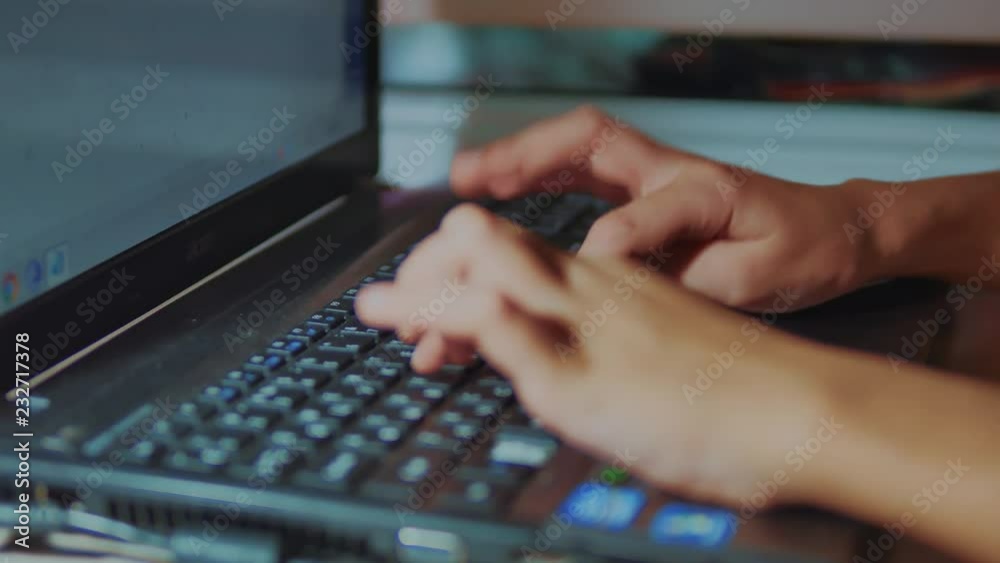 teen girl works on a laptop big hands. teen girl writes a message in social media. business education concept lifestyle teen girl works on a laptop big hands. teen girl writes a message in social media. business education concept lifestyle