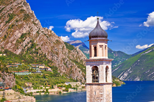 Tower in Limone sul Garda and lake cliffs view