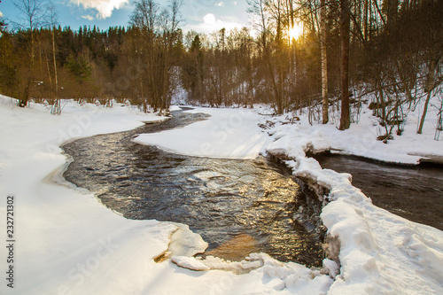 Winter. The river is freezi...