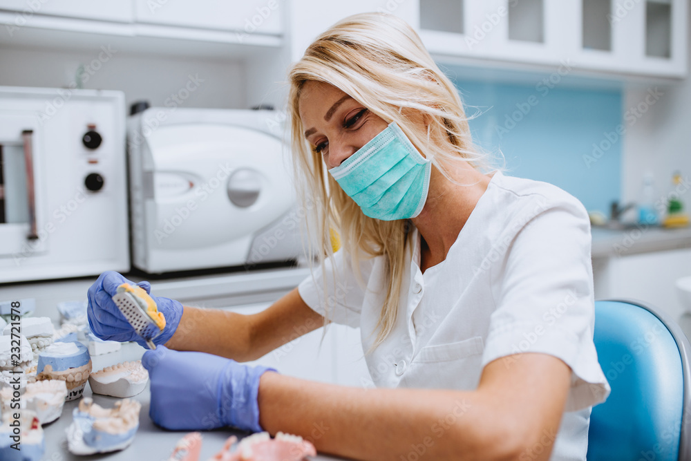 Dental technician making dentures. Dental prosthesis, prosthetics work. Dental technician making dentures. Dental prosthesis, prosthetics work.