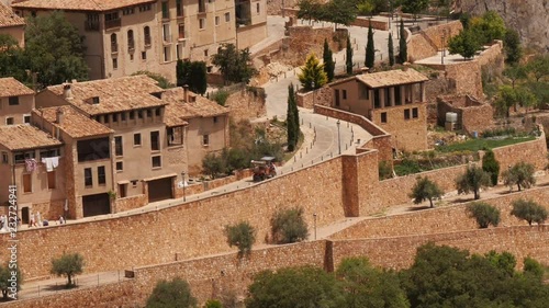 Truck driving through the medieval village of Alquézar, Huesca Aragon, Spain – shot from above.