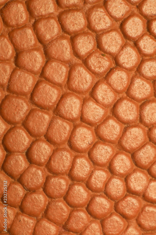 Fototapeta premium Basketball ball closeup texture. macro background