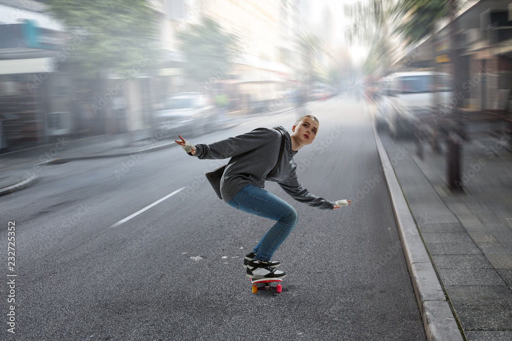 Teenager girl ride her skateboard. Mixed media Teenager girl ride her skateboard. Mixed media