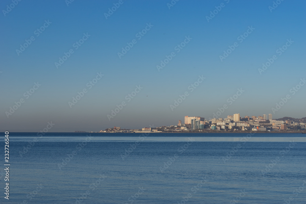 Seascape with views of the coastline and the architecture of the city.