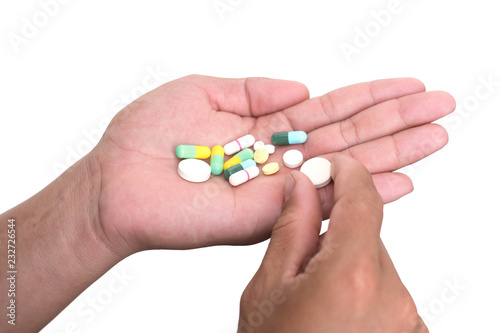 Drugs in hand isolated on a white background. With clipping path