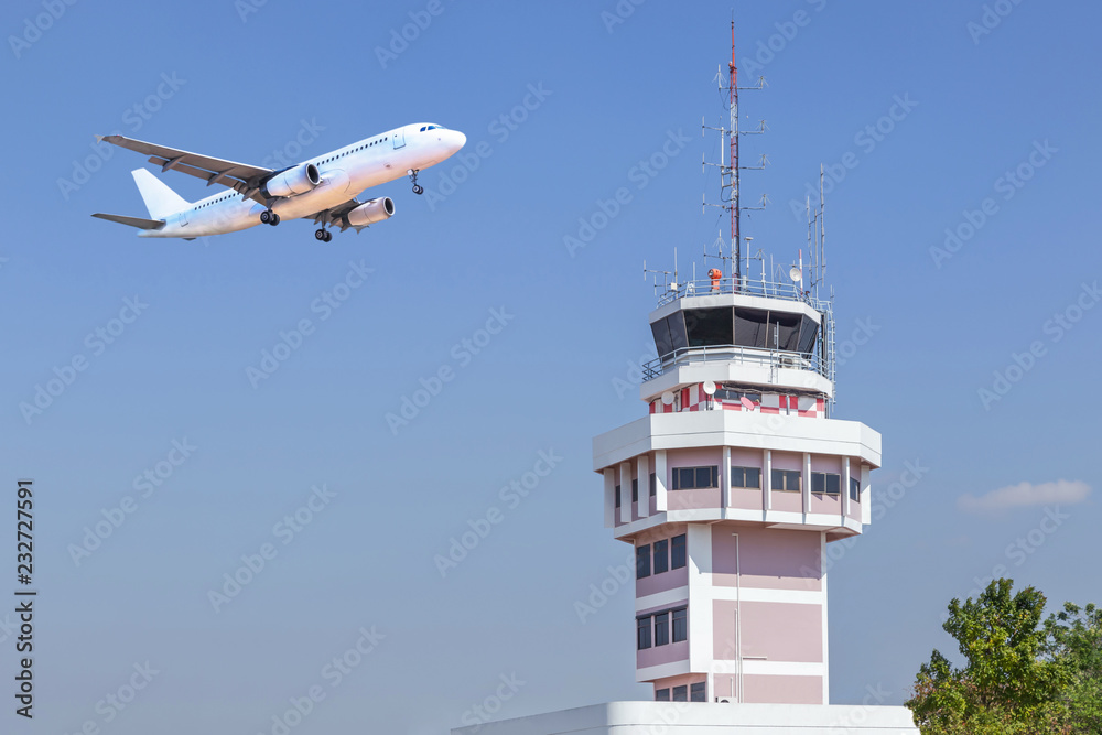 Air traffic control tower in international airport with passenger