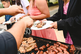 Diners invited to a barbecue serving.