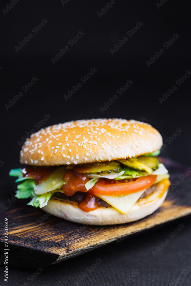 homemade chicken burger with cheese , greens, red onion and beet sauce,  Big chicken hamburger with cheese, tomato and lettuce,  Fresh tasty chicken burger ,  grilled chicken burger