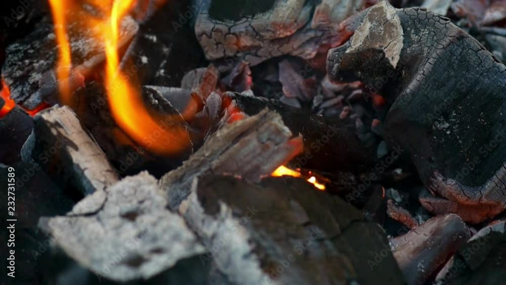 Closeup view of coals glowing in fireplace Closeup view of coals glowing in fireplace